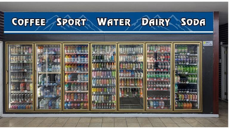 Eagle Mart convenience-store beverage wall labeled Coffee, Sport, Water, Dairy, Soda